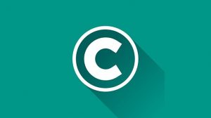 Graphic of copyright symbol in white on green background, with shadow