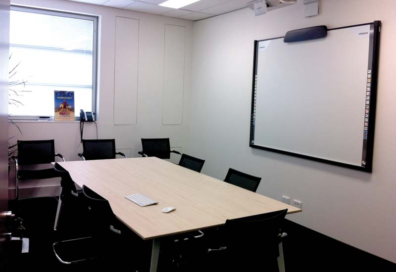 Bonnie Doon meeting room at Screenrights office - table with 8 chairs and whiteboard