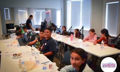 Young Pasifika Animators at work kids drawing storyboards as part of a workshop shession